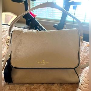 Kate Spade Chester Street Miri pebble Crossbody bag. Tan w/ black trim & tassel.
